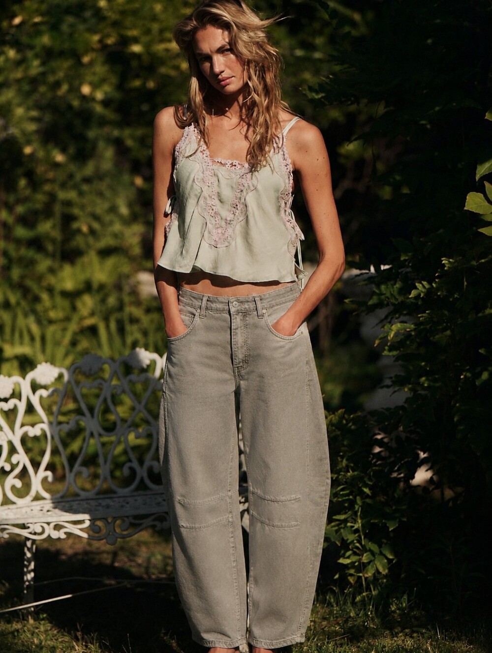 We The Free Good Luck Mid-Rise Barrel Jeans in a light olive wash